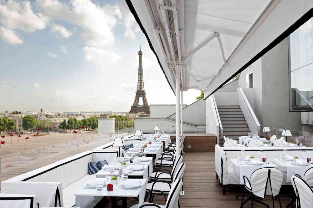 View of the Eiffel Tower from a restaurant terrasse